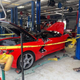 Illustration for article titled Corvette C8 fell off lift, I feel bad for the tech.